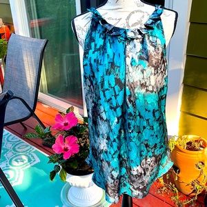 Sleeveless shell or stand alone top